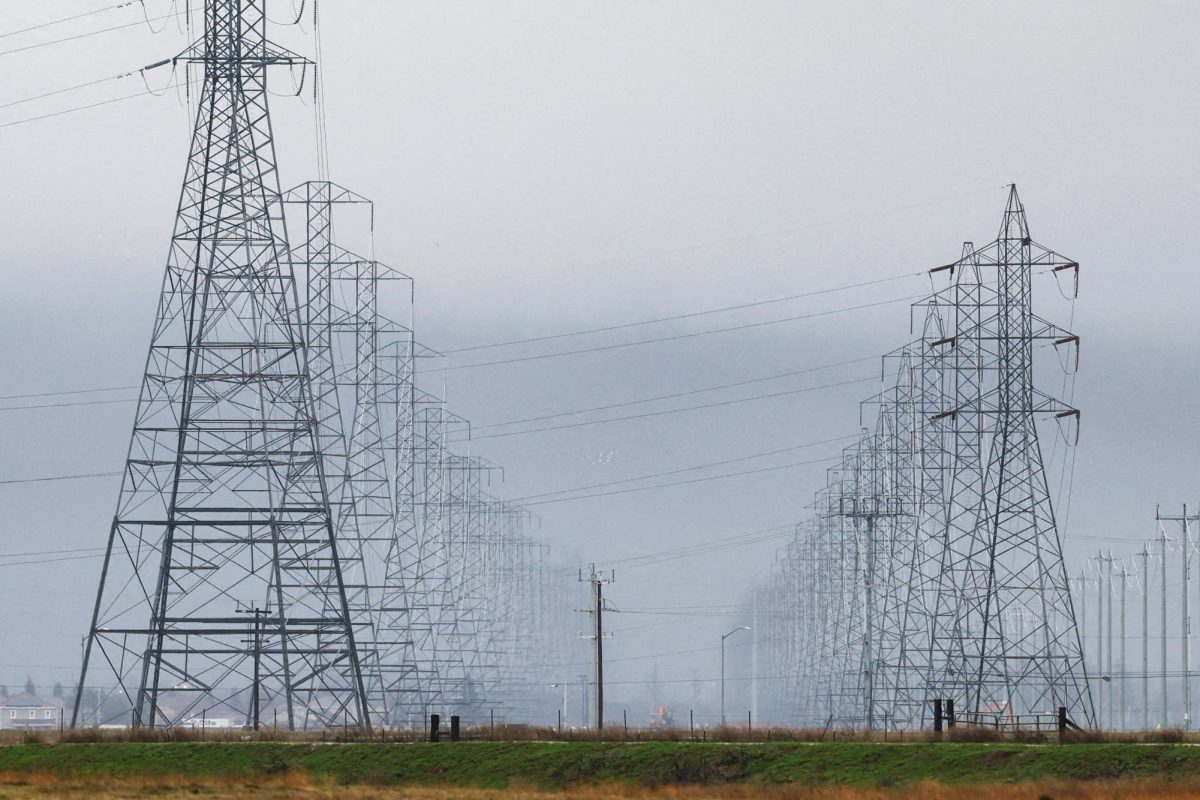 High tension power lines with winter storm clouds behind them are seen in Sacramento County in Sacramento, California, U.S. January 9, 2023. REUTERS/Fred Greaves