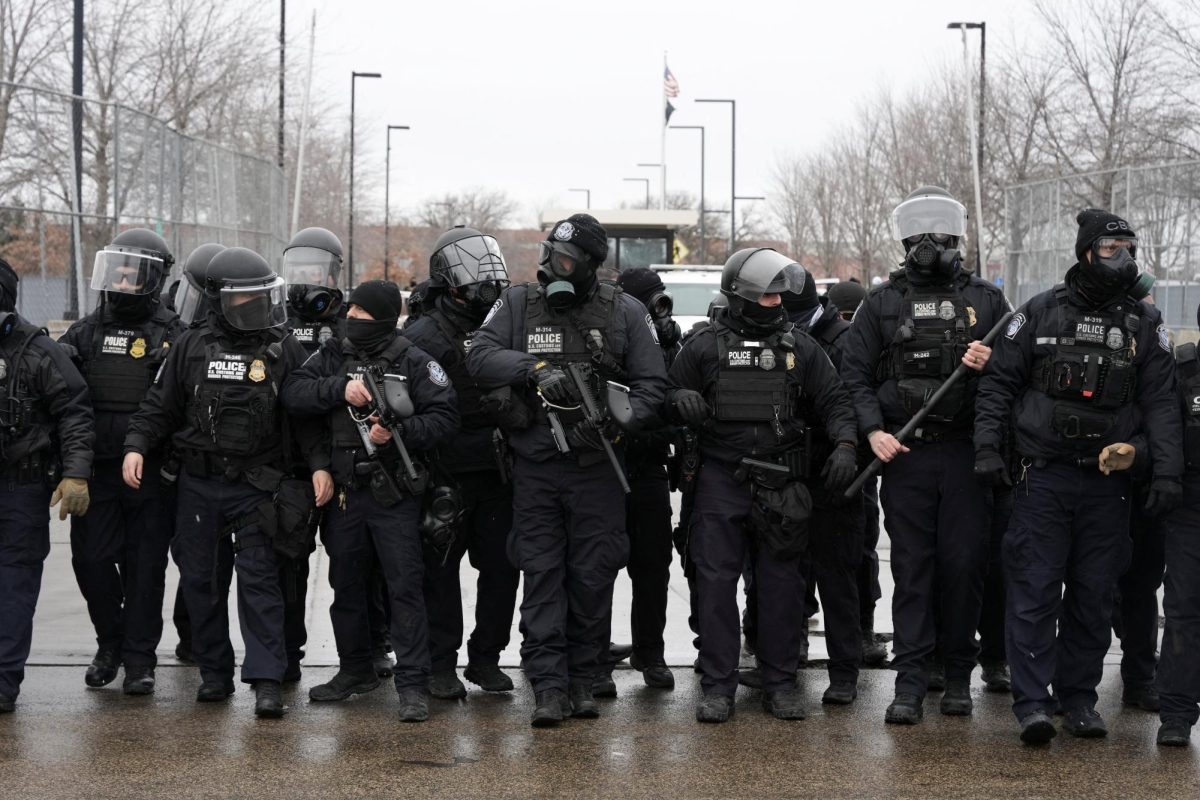 U.S. Customs and Border Protection (CBP) agents stand guard during a protest outside the Whipple Federal Building, more than a week after a U.S. Immigration and Customs Enforcement (ICE) agent fatally shot Renee Nicole Good on January 7, in Minneapolis, Minnesota, U.S., January 16, 2026. REUTERS/Tim Evans