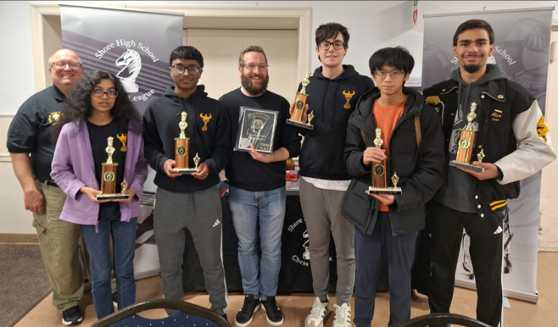 The Varsity Chess Team celebrates a third-place finish at the Shore HS League Championship